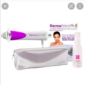 Derma Wand Pro, new in opened box with unopened lotion, facial cream.
